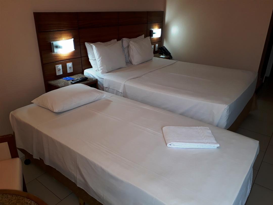 Standard Double Bed + Single Extra Bed