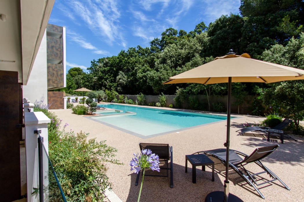 Swimming pool with spa