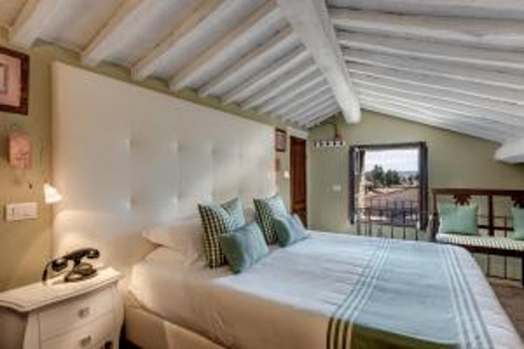 Room at PALAZZO DEL CAPITANO Wellness & Relais - Luxury Borgo Capitano Collection, SAN QUIRICO D ORCIA