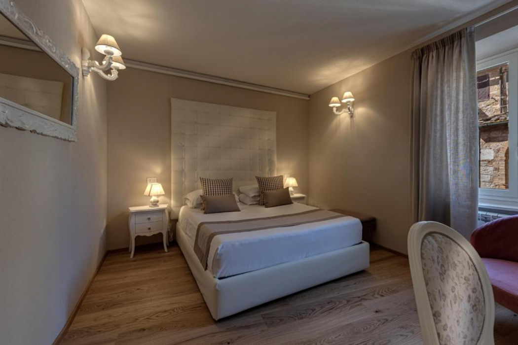 Room at PALAZZO DEL CAPITANO Wellness & Relais - Luxury Borgo Capitano Collection, SAN QUIRICO D ORCIA