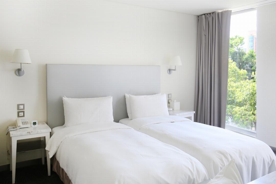 غرفة ديلوكس بسريرين منفصلين، Ambience Hotel 3/6