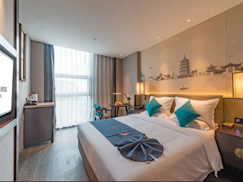 Rezen Dong Hotel (Hangzhou Jiubao Subway Station) 2/4