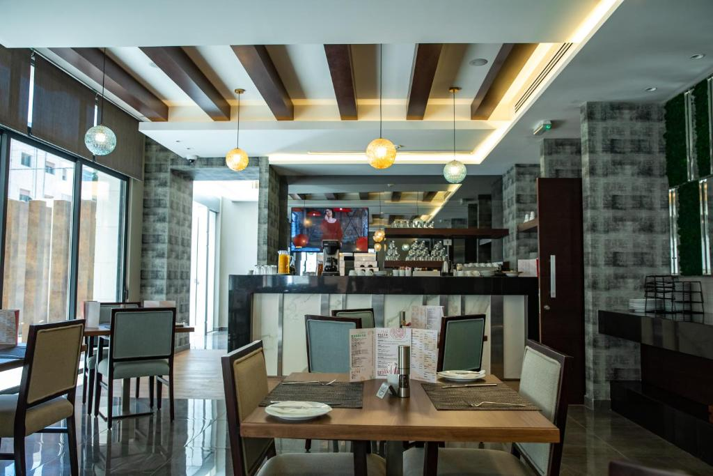 Compass Amman 24/46