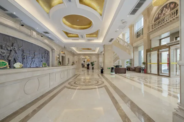 Vienna International Hotel (Henan Xinyang Municipal Government Railway Station) 3/18