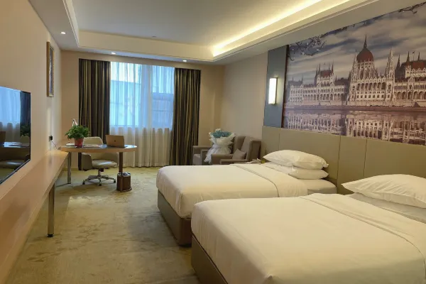 Vienna International Hotel (Xinyang Railway Station) 24/51