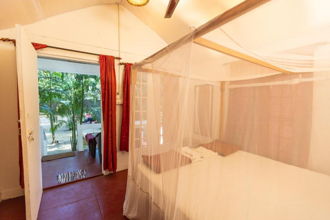 Room at Feather Touch Hotels and Resorts, CANACONA