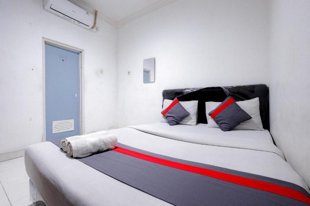 Super OYO 91535 J&b Rooms Tomang 14/35