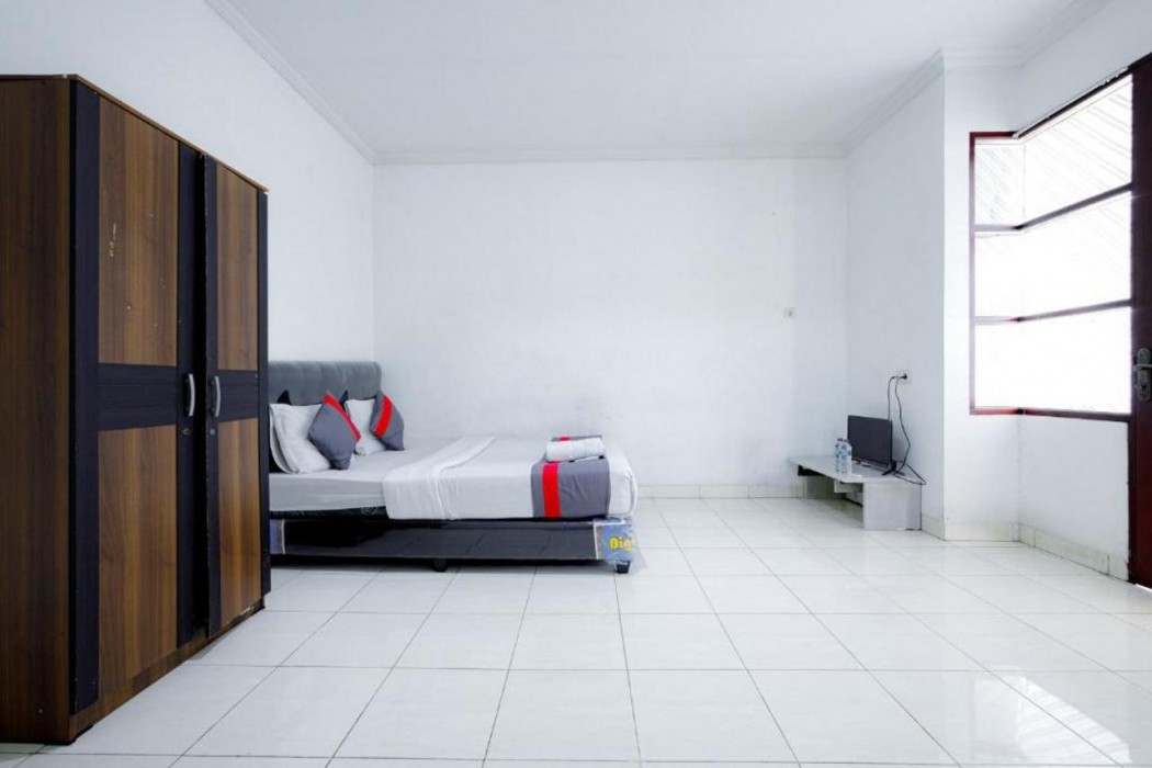 Super OYO 91535 J&b Rooms Tomang 15/35