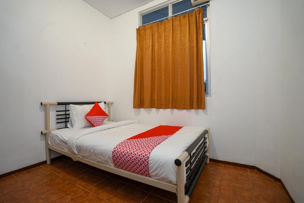 Super OYO 1844 Bravo Residence 13/39