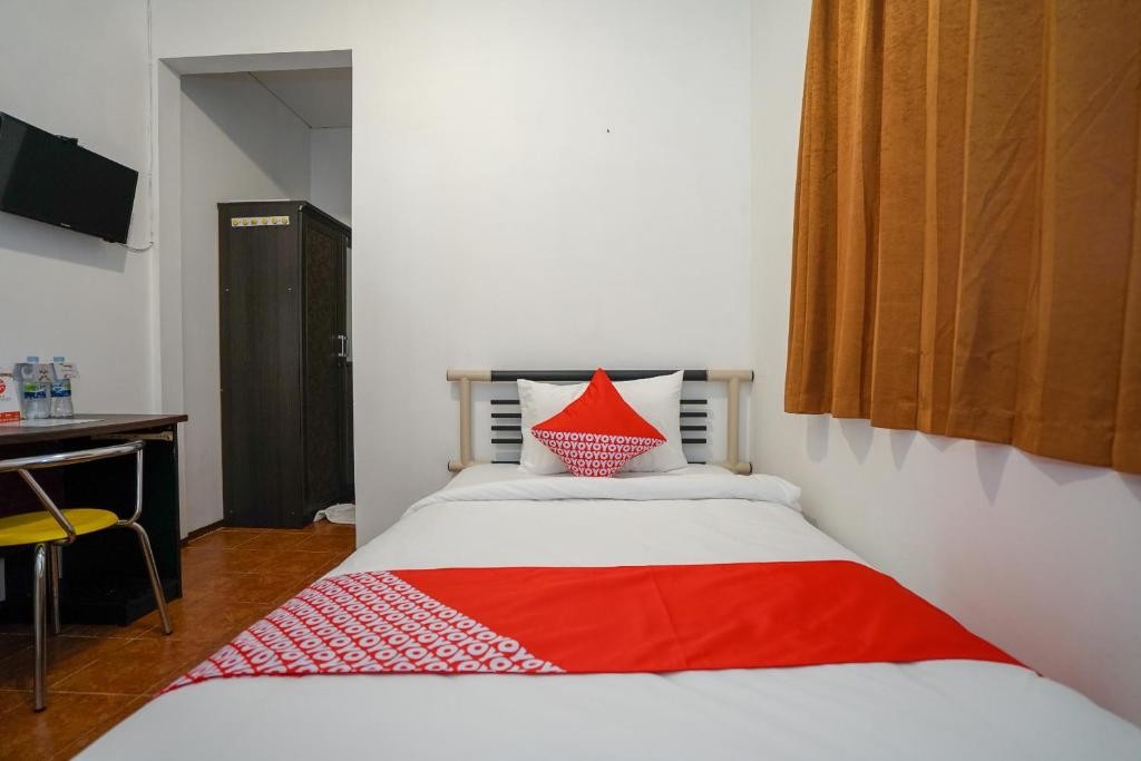 Super OYO 1844 Bravo Residence 10/39