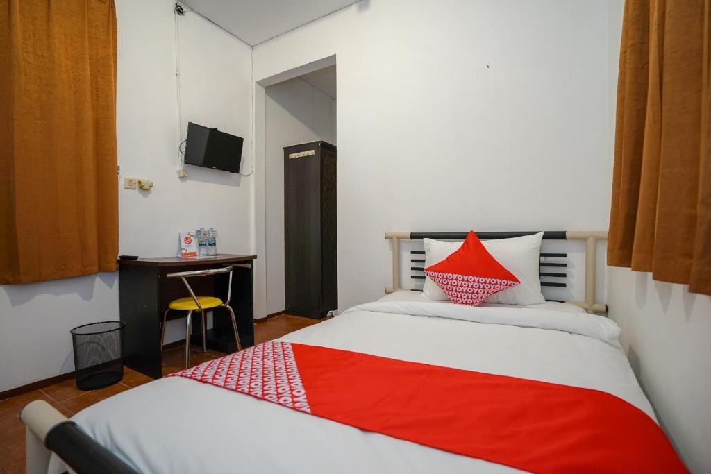 Super OYO 1844 Bravo Residence 9/39