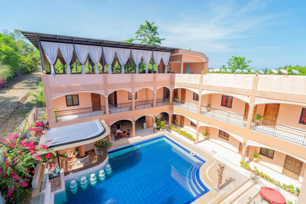 Dinah's Tourist Inn Puerto Princesa by ZUZU