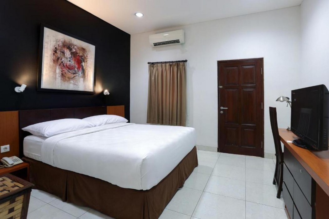 Room at Jambuluwuk Heritage Menteng Suites, JAKARTA