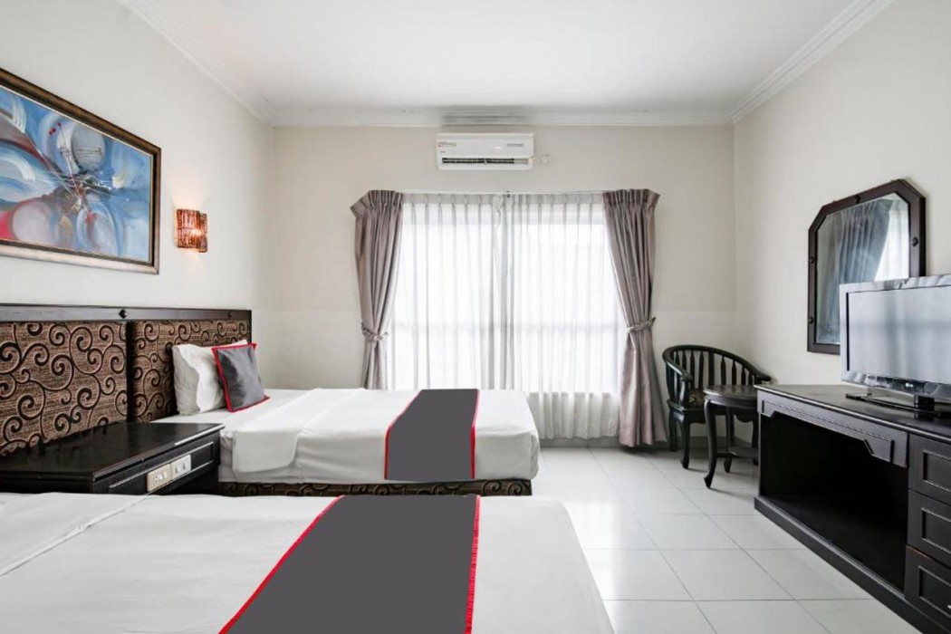 Collection O Senapelan Near Rsud Petala Bumi Formerly De Town Hotel 10/54