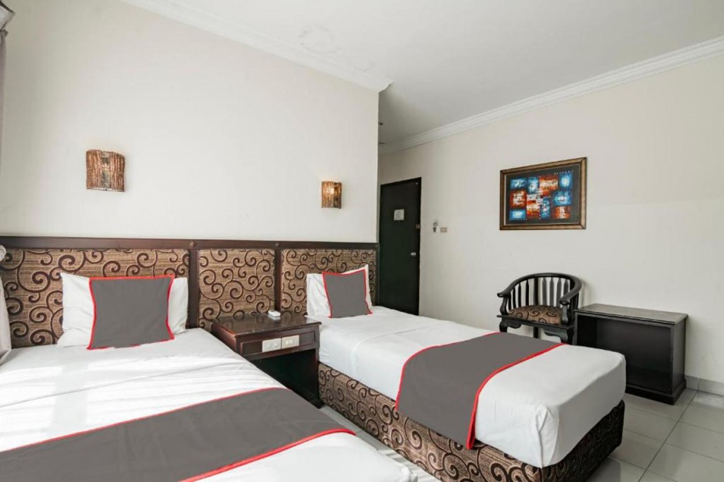 Collection O Senapelan Near Rsud Petala Bumi Formerly De Town Hotel 13/54