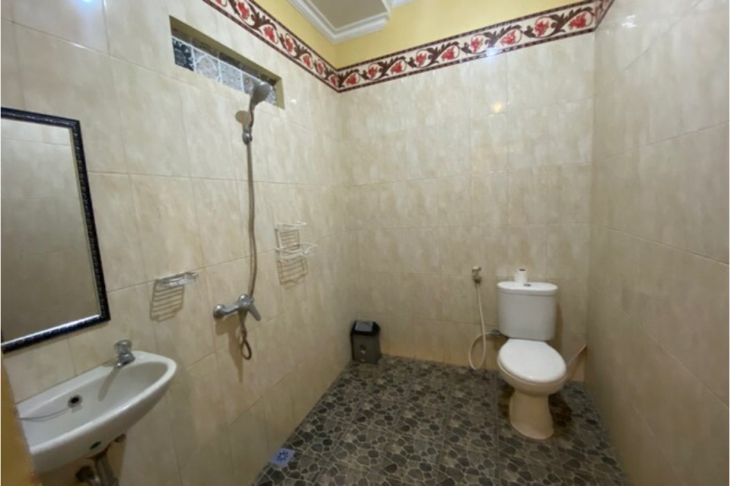 Capital O 93844 Arta Adi Homestay NearBali Zoo 15/24