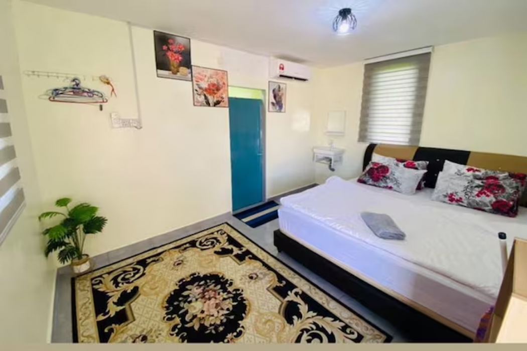 Room at Capital O 91180 Mentari Senja Homestay, Padang Serai