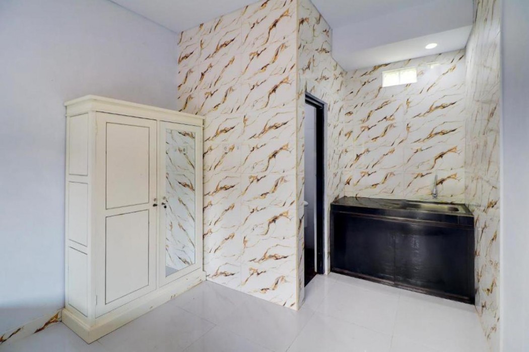 Hotel O near Rumah Sakit Mangusada Badung formerly Puri Malika Cozy Exclusive 9/16